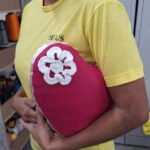 Solidariedade que transforma: detentas produzem apoio para mulheres com câncer